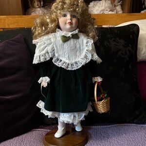 Holly by Dynasty dolls porcelain Doll in Velvet Green Dress with Basket